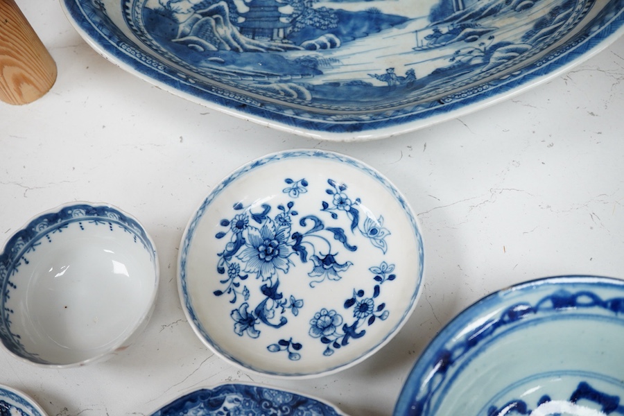 A group of 18th/19th century Chinese blue and white porcelain tea and dinner wares and an unusual Chinese soft paste porcelain famille rose saucer dish